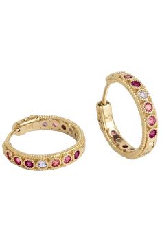 Handcrafted in Spain, creole hoop earrings feature Baroque styling with intricate golden accents and vibrant pink and white zircon circular stones. Perfectly sized for everyday wear and crafted with 18K gold-plated sterling silver. The hoops brilliantly dazzle in the sun and light creating an earring perfect for day to night style. Spanish crafting excellence! 18K Gold, Sterling Silver, 12 Pink Zircon Gemstones, White Zircon Gemstones 5/8" Circumference, 1/8" Width Creole Hoop Water-resistant Ha Pink Cubic Zirconia Hoop Jewelry, Pink Cubic Zirconia Hoop Earrings, Elegant Jeweled Round Hoop Earrings, Elegant Jeweled Hoop Earrings, Pink Hoop Earrings In Fine Jewelry Style, Pink Gemstone Hoop Jewelry, Pink Round Huggie Earrings, Fine Jewelry Pink Hoop Earrings, Pink Round Pierced Hoop Earrings