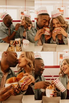 a man and woman eating hot dogs at a fast food restaurant while wearing paper hats