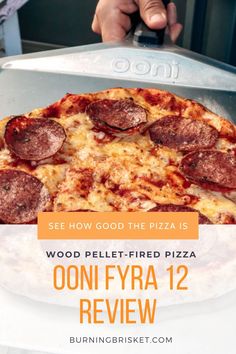 pizza on an Ooni pizza peel Ooni Pizza Oven, Incredible Pizza, Ooni Pizza, Cheap Stocking Stuffers, Bbq Gifts, Wood Pellets, Pellet Grill, Wood Fired Pizza, Good Pizza