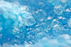 blue ice crystals are shown in close up