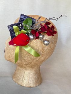 "Dress up your darling hair-do with this vintage-inspired Christmas fascinator adorned with bright Christmas cardinal bird, periwinkle crushed velvet ribbon, lime ribbon, silver berries and red glitter flowers.  Includes an alluring snowy glitter branch to add a little chic charm that will be sure to turn heads.  Inspired by my love of 1940's actresses who always were dressed to the 9's. I imagine wearing this to a coffee, afternoon tea or book club where the ladies get down to gossip,  gabbing and chisme while showing off their fabulous suits and dresses to each other. The alligator clip makes this adornment very versatile: it can be worn in any position on the head, or can even be attached to a blouse, bracelet, hat or worn as a corsage to bring more beauty to your day. Express your rega Christmas Fascinator, Flower Cottagecore, Periwinkle Purple, Vintage Inspired Christmas, Christmas Cardinals, Cardinal Bird, Glitter Flowers, Ribbon Flower, Cardinal Birds