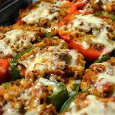 stuffed bell peppers with meat and cheese on them are ready to be served in the oven