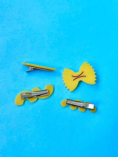 When we die, bury us in carbs baby ✨ This set of 2 noodle hair clips will jazz up your 'do for any shindig! ✦ Made from cellulose acetate (biodegradable--heck yeah!) and metal. ✦ Clips range anywhere from 1.5-2" in length. ✦ Created with 💘 in San Francisco, CA. Ceramic Hair Clips, Noodle Hair, Accessorize Bags, Ceramic Hair, Heck Yeah, Mixed Hair, Book Clothes, Peach Fuzz, Bandana Hairstyles