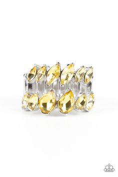 Increasing in size near the center, a row of yellow marquise style rhinestones stacks above a row of yellow teardrop rhinestones for a timelessly stacked look. Features a stretchy band for a flexible fit. Featured inside The Preview at ONE Life! Sold as one individual ring. P4RE-YWXX-051XX Yellow Ring, Freelance Makeup Artist, Pink Jewels, Yellow Rings, Stretch Ring, Rhinestone Ring, Paparazzi Accessories, Inspired Jewelry, Paparazzi Jewelry