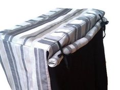 a black and white striped table cloth with ties