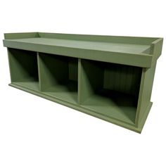 a green shelf with three compartments on each side