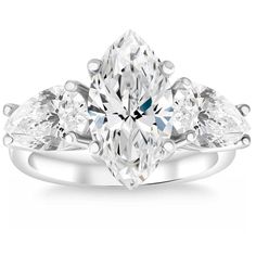 a three stone engagement ring with pear shaped diamonds