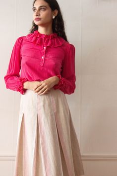 Beautiful late 1970s to early 1980s YSL silk blouse in hot pink with ruffled collar and cuffs. Half placket, contrast stitch. label: Yves Saint Laurent Rive Gauche; Made in France measurements: estimated modern size: XS to S (shown on 5'8 model, size 4) length: 25" shoulder: 15" sleeve: 24" bust: 38" materials: 100% silk condition: Excellent vintage condition ALL SALES FINAL Feminine Pink Blouse With Smocked Cuffs, Fitted Pink Blouse With Smocked Cuffs, Retro Blouse With Ruffled Collar, Pink Ruffled Collared Blouse, Pink Ruffled Blouse With Collar, Steampunk Fashion Women, Ruffled Blouse, Ruffled Collar, Rive Gauche