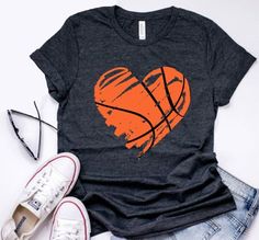 a t - shirt with an orange basketball heart on it