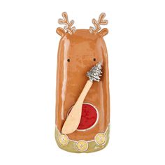 a ceramic toothbrush holder with a deer design