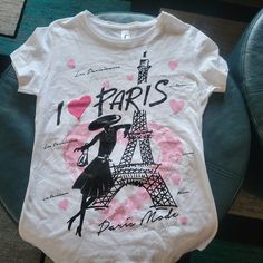 Souvenir From My Trip To Paris. Bought It For My Mom And It Was Too Big Never Worn Smoke Free Pet Free Home Paris Theme Shirts, Trip To Paris, Paris T Shirt, For My Mom, My Trip, My Mom, Shirt Color, Pink White, Pink Ladies