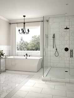 a bathroom with a tub, shower and window