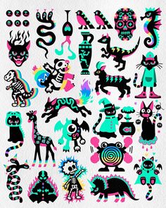 an assortment of colorful stickers on white paper with black and blue designs in the shape of cats