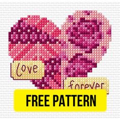 a cross stitched heart with the words love forever written on it in yellow and pink