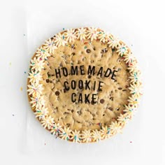 a cookie cake with the words homemade cookie cake written on it