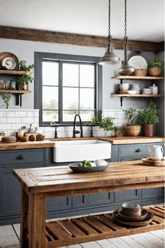 Farmhouse kitchen island with a custom-built wood base and a butcher block countertop Small Farmhouse Kitchen Remodel, Small Farm Kitchen, Kitchen Inspo Modern Farmhouse, Craftsman Farmhouse Kitchen, Farmhouse Kitchen Remodel Ideas, Organic Modern Farmhouse, Small Modern Farmhouse Kitchens, Farmhouse Kitchen Islands, Blue Farmhouse Kitchen