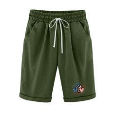 a green shorts with an american flag on the side and a white drawstring