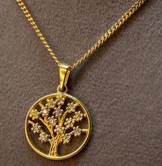 "14kGold Tree of Life Necklace ,curb chain ,18\" ,1.5mm, 3.11gr Premium spring ring for added safety! Priced to sell! Compare our prices to other similar sellers! Arrives in a GIFT BOX and includes FREE SHIPPING within the USA and Canada. International shipping is available at the most economical rates on ETSY. I HAVE BEEN IN THE JEWELRY BUSINESS ALL MY LIFE. I am a second -generation family member making gold and jewelry. Please feel free to ask me any questions - Always happy to help! Fast Rep Curb Chain Pendant Necklaces For Anniversary, Yellow Gold Curb Chain Necklace For Anniversary, Yellow Gold Necklace With Curb Chain For Anniversary, Anniversary Yellow Gold Curb Chain Necklace, Anniversary Yellow Gold Necklace With Curb Chain, Gold Tree Of Life, Tree Of Life Ring, Necklace For Her, Gold Tree