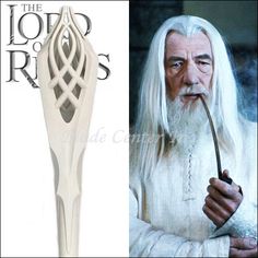 an old man with long white hair holding a pipe in his right hand and the lord of rings logo on it