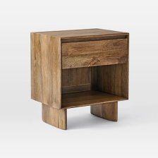 a small wooden table with an open drawer