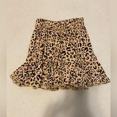 This Skirt Is From Blush Boutique And Has Never Been Worn. Perfect Condition. Smoke Free Home. Size Small! Casual Brown Ruffled Mini Skirt, Casual Brown Ruffled Skirt, Casual Leopard Print Flowy Skirt, Casual Flowy Leopard Print Skirt, Casual Brown Skirt For Vacation, Blush Boutique, Leopard Print Skirt, Print Skirt, Black Tan