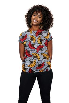 This Ankara Wax Print Women T-shirt is made with high-quality Ankara wax print fabric, known for its vibrant colors and bold patterns. The lightweight and breathable material make it perfect for warm weather, while the unique design adds a touch of culture to any outfit. Elevate your style effortlessly with this versatile t-shirt. Product Features Please Compare your Measurements To our Size Chart This T-shirt is Designed for fashionable women. Made from 5.47 Oz. 100% polyester. Double-needle he Cotton Short Sleeve Shirt With Vibrant Print, Short Sleeve Cotton Shirt With Vibrant Print, Vibrant Print Short Sleeve Cotton Shirt, Casual Short Sleeve Top With Bold Print, Casual Short Sleeve T-shirt With Unique Print, Pattern Print Cotton Short Sleeve Top, Cotton Short Sleeve Top With Pattern Prints, Cotton Tops With Pattern Prints And Short Sleeves, Cotton Top With Pattern Prints And Short Sleeves