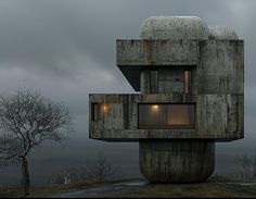 a concrete structure with windows on top of a hill