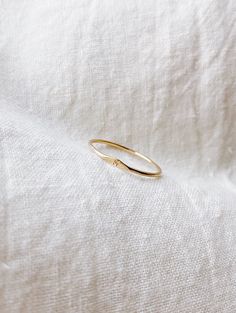 MICRO SIGNET RING A solid 14k gold ring that has a dimple on a ring with a tiny initial/letter of choice. Each ring is madd-to-order with love and is carefully handcrafted (may be slightly different than picture). This is a perfect everyday ring that is great for gifting. + 1mm band solid 14k Yellow Gold ring + Micro initial + Comes in a box + Available characters in Capital letters from dropdown bar: A B C D E F G H I J K L M N O P Q R S T U V W X Y Z + Please note all Mantle 14k gold pieces ar M And P Letter Love, M Jewelry Letter, M Ring Letter, Gold Initial Open Ring With Single Diamond, Gold Initial Ring With Single Diamond, Gold Open Ring With Single Diamond, Initial Design, Gold Open Ring With Single Diamond Initial, Gold Open Ring With Single Diamond, Minimalist Tarnish-resistant Diamond Ring