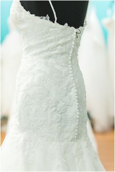 the back of a wedding dress on display