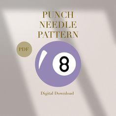 a purple and gold eight ball with the number 8 on it's front cover