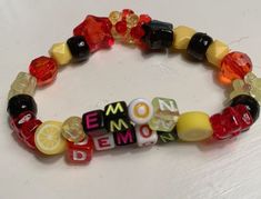 Lemon Demon Bracelet, Kandi Chain Tutorial, Fun Bracelet Ideas, Silly Bracelet Ideas, Kandi Bracelets Singles, Kandi Singles Ideas Words, Friendship Bracelet Ideas Beads, Bracelet Ideas With Words