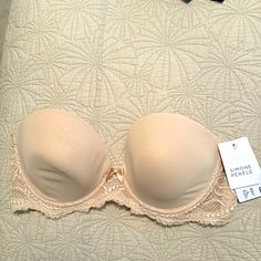 Beautiful Simone Perele Strapless Bra. New With Tags. Elegant Strapless Bra Partially Lined, Elegant Strapless Partially Lined Bra, Elegant Strapless Bra For Spring, Elegant Spring Stretch Bra, Demi Cup Bra, Half Cup Bra, Simone Perele, Nude Bra, Lace Set