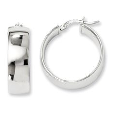 Classic and traditional, these hoop earrings are the perfect anytime look. Created in sleek sterling silver, these 7.5 x 25.0mm hoops complement any attire. Polished to a brilliant shine, the hoop earrings secure comfortably with hinged backs. Fine Earrings, Earring Backs, White Metal, Designer Earrings, Precious Metals, Fashion Earrings, Types Of Metal, Sterling Silver Earrings, Metallic Silver