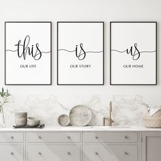 three black and white posters with the words family love on them in a kitchen area