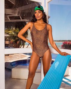 Description: Turn heads at the beach or pool with our Animal Print Polyamide Swimsuit, featuring a daring low-cut and exposed back. Crafted from high-quality polyamide, this swimsuit combines a bold animal print with a sophisticated silhouette, ensuring you make a stylish statement. Features:- Premium polyamide fabric for a smooth, durable, and comfortable fit- Bold animal print for a trendy and eye-catching look- Low-cut back for a daring and elegant design- Exposed back adds a chic and sensual Animal Print Swimsuit, Print Swimsuit, Trending Now, Low Cut, At The Beach, Elegant Design, Animal Print, The Beach, Comfort Fit