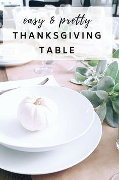 a white plate topped with a pumpkin sitting on top of a table