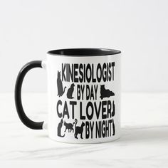 a black and white coffee mug with the words percussionist by day, cat lover by night