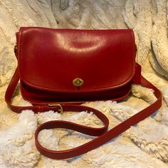 Vintage Coach City Shoulder/Crossbody Bag In Red Leather Style Number 9790. Adjustable Shoulder Strap, Brass Hardware, Zip Interior Pocket, Outside Pocket In Back And Pocket Under Flap. There Is Some Wear On The Corners (See Photos) But Overall This Bag Is In Very Good Vintage Condition. It’s A Classic Coach That You’ll Own Forever. Approximate Measurements: Length 10.5” Height 8.5” Width 3.25” Crossbody Strap Up To 20” Formal Red Satchel Saddle Bag, Formal Red Saddle Bag Satchel, Red Saddle Bag With Gold-tone Hardware, Classic Red Shoulder Bag For Travel, Red Crossbody Flap Bag, Classic Red Flap Bag For Shopping, Chic Red Saddle Bag With Adjustable Strap, Elegant Red Saddle Bag With Gold-tone Hardware, Chic Red Saddle Shoulder Bag