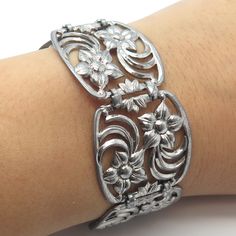 Great vintage condition.  925 Sterling Silver Vintage W. E. Richards Floral Panel Link Bracelet 7.75"  Weight: 37.6g   WELCOME TO PAWN SHOP We are an actual pawn shop and have been in business for over 25 years. Since 1990, our establishment has been serving a variety of clients by providing them with short term cash solutions and options of liquidity regarding their treasured heirlooms. Acknowledging that today′s customers are very sophisticated and are looking for a variety of investments, our Vintage Collectible Bracelets, Collectible Vintage Bracelets, Classic Engraved Sterling Silver Bracelet, Vintage Silver Bracelet With Oxidized Finish, Vintage Sterling Silver Bracelet Stamped 925 For Formal Occasions, Vintage Sterling Silver Bracelet In White Gold, Vintage Engraved Sterling Silver Bracelet, Vintage Silver Bracelets With Oxidized Finish, Vintage White Gold Bracelets Stamped 925