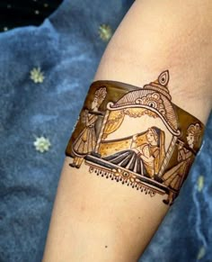 a tattoo on the arm of a woman