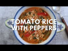 a bowl of tomato rice with peppers