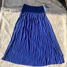 Has Stretchy Top Of Maxi Skirt/Dress. Beautiful Royal Blue Color. Bottom Flows Into A-Line Skirt. One Size But Fits Like Large. Blue A-line Dress With Lined Skirt, Chic Blue A-line Maxi Skirt, Blue A-line Maxi Skirt With Lining, Blue Pleated Midi-length Skirt, Blue Fitted A-line Maxi Skirt, Chic Flowy Blue Skirt, Blue Pleated Stretch Dresses, Blue Stretch Pleated Dresses, Stretch Blue Pleated Dresses