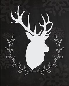 the silhouette of a deer with antlers on it's head is surrounded by leaves