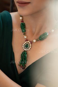 Be the center of attention with this unique and stylish Emerald green necklace. Strung with beautiful jade green stones, pearls, and tourmaline stones, this necklace also showcases a polki encrusted floral pendant adorned with an emerald green stone. Perfect for any occasion, this necklace is sure to make a statement! Closure - Lobster Weight - 92gm Polki Pendant, Emerald Green Necklace, Green Pendant Necklace, Emerald Green Stone, Green Pendant, Green Pendants, Green Stones, Floral Pendant, Tourmaline Stone