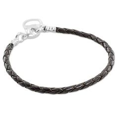 Featuring a braided brown leather cord this Guatemalan wristband bracelet speaks of the many miles walked during a lifetime. A single circular charm made from fine silver hangs from it molded with care by the artisans at Chicas Joyeras de Jalapa a group of women who work together to achieve economic empowerment. Classic Adjustable Braided Bracelet With Lobster Clasp, Silver Braided Leather Jewelry, Braided Silver Leather Jewelry, Everyday Brown Braided Jewelry, Everyday Silver Leather Braided Bracelet, Classic Braided Leather Jewelry, Silver Leather Bracelet With Lobster Clasp For Everyday, Everyday Silver Leather Bracelet With Lobster Clasp, Everyday Adjustable Braided Bracelet With Lobster Clasp