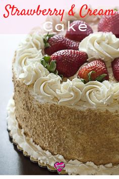 a cake with strawberries and cream frosting on it