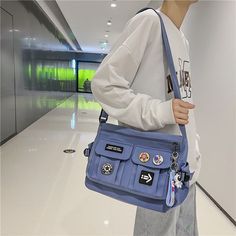 Harajuku Men Nylon Crossbody Bags for Women Messenger Bag Girls School Book Bags Youth Canvas Handbags Shoulder Bag Sac Bolsas SPECIFICATIONS Size: length 30cm,Width 15cm,Height 45cm Shape: Trapeze Occasion: Versatile Main Material: nylon Lining Material: Polyester Interior: Cell Phone Pocket,Interior Zipper Pocket Gender: Unisex Feature: fashion bag,student bag,Nylon bag,school bag Decoration: Appliques Color: Black/Green/Purple/Khaki Closure Type: zipper Precautions 1: The unit of measurement (CM), the picture model wears for reference only 2: Manual measurement will have an error of 1-3cm, please understand 3: The color of images might be slightly different than real product due to the shooting light intensity colour: Black/White/Grey/Blue School Book Bags, Harajuku Men, School Bookbags, Short Sleeve Summer Dresses, Book Bags, Student Bag, Girls School, Crossbody Bags For Women, School Books