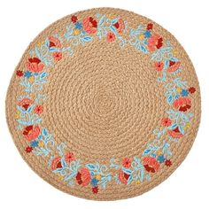 a round rug with flowers on it