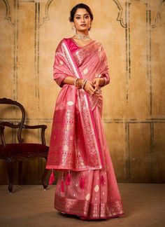 Get ready to shine in our Premium Pink Zari Weaving Tissue Silk Festive Saree! With a unique Latakan design on the pallu and a beautiful matching blouse, this saree will make you stand out. The weaving border adds a touch of elegance to this must-have for women. Don't miss out on this one-of-a-kind piece. (Limited stock available! The unstitched blouse can be customized upto 44 inches. Do Note: All the accessories shown are for styling purpose only. Slight color variation may occur due to photog Tissue Saree, Art Silk Sarees, Elegant Saree, Fancy Sarees, Soft Silk Sarees, Traditional Sarees, Jodhpur, Pink Saree, Party Wear Sarees