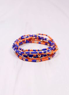 This beautiful bracelet set is made up of seven individual strands. It is beaded in a two tone color fashion with gold spacer beads. The strands can be worn all together for a perfectly stacked look, or mix and match them to create your own style. Stretch to fit most wrists. Own Style, Color Fashion, Cute Jewelry, Mix And Match, Colorful Fashion, Spacer Beads, Beautiful Bracelet, Bracelet Set, Blue Orange